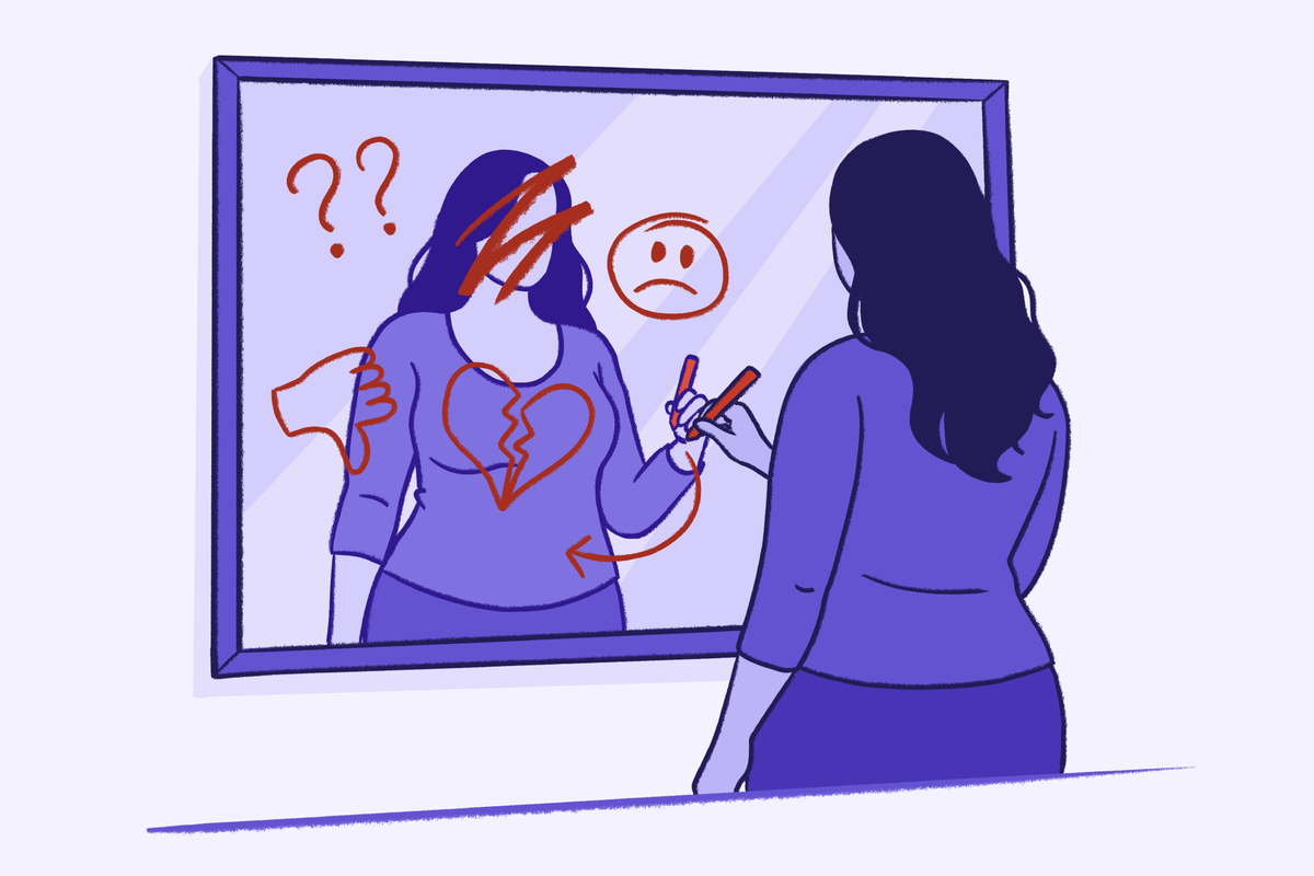 An illustration of a woman standing before a mirror, using a red marker to draw self-critical symbols—like a broken heart, a frowny face, and a thumbs down—over her own reflection