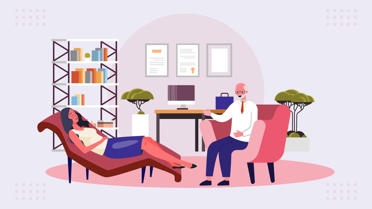 A flat vector illustration of a therapy session. A woman lies relaxed on a brown chaise lounge while an elderly male therapist with glasses sits in a pink armchair, gesturing as he speaks.