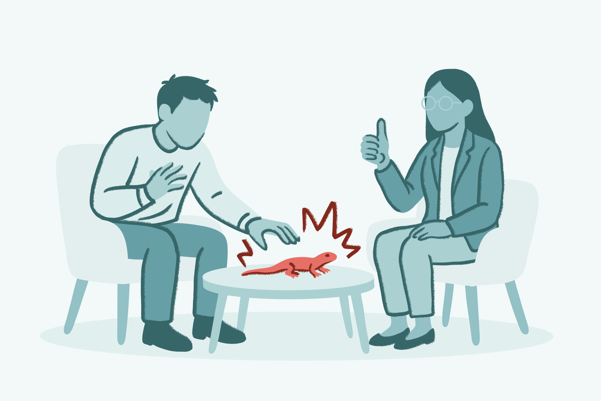 A stylized illustration of a man sitting in a chair, tentatively reaching out to a small red lizard on a coffee table while a therapist-like figure gives a thumbs up
