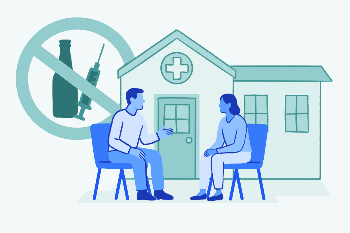 Illustrated scene showing two people in blue tones having a therapy conversation while seated, with a teal treatment center building featuring a medical cross and a prohibition symbol showing crossed-out alcohol bottle and syringe