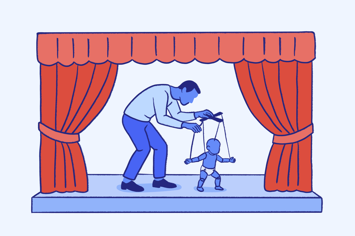 Person controlling puppet on red-curtained stage illustrating psychodrama therapy