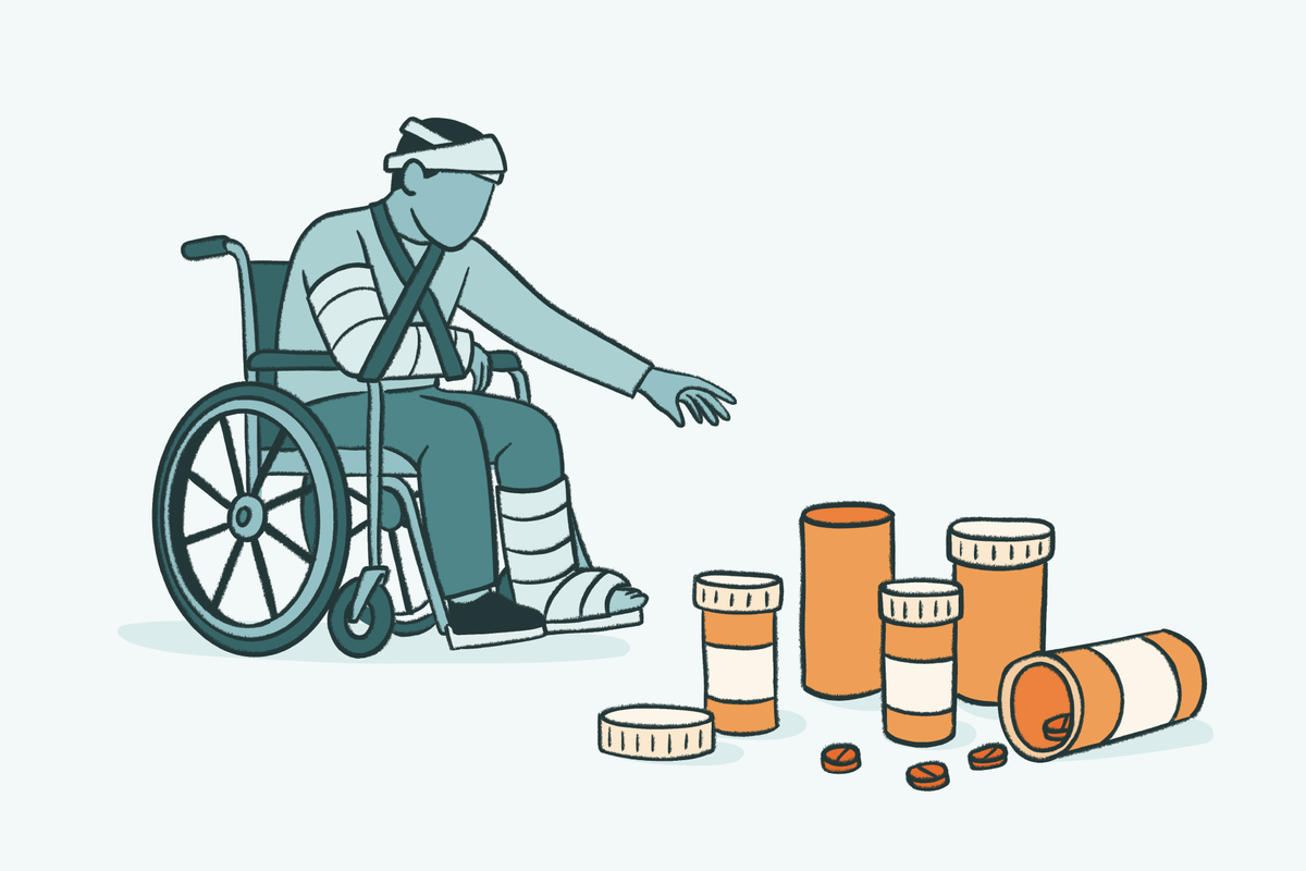 Person in wheelchair with head and arm injuries reaching toward multiple prescription pill bottles and scattered pills illustrating painkiller dependence and opioid misuse risk.