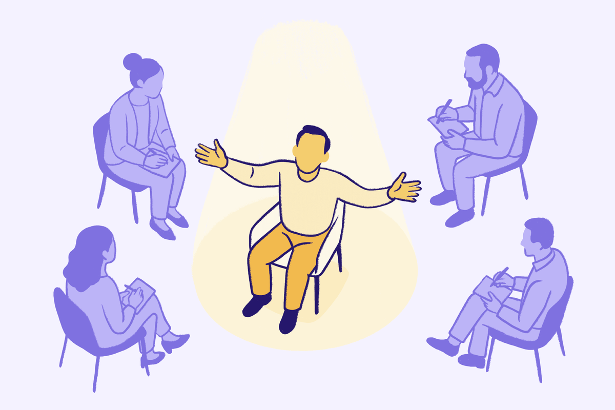 Person-centered therapy group session illustration with the client speaking openly while therapists take notes in a supportive mental health setting.