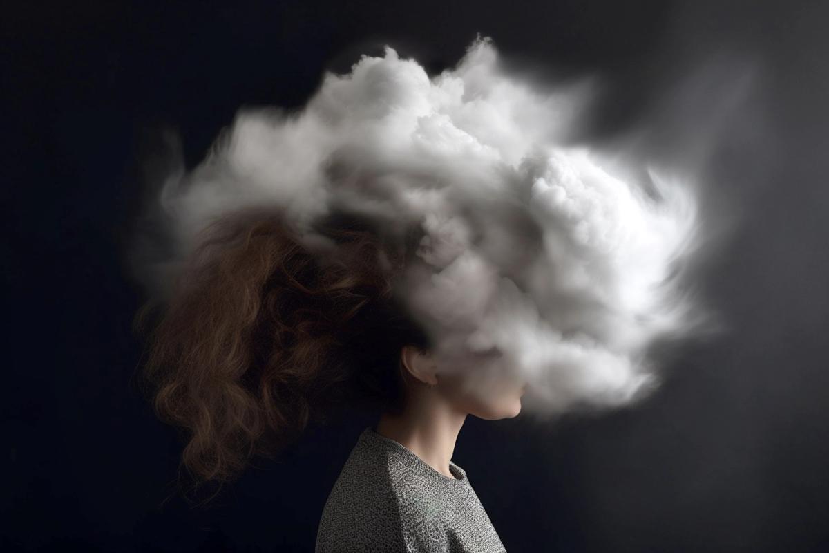 Woman with cloud obscuring her head, representing the cognitive impairment and mental confusion caused by mixing alcohol and methamphetamine